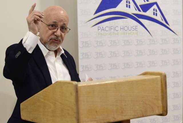 Executive Director Rafael Pagan speaks as Pacific House holds a ribbon cutting ceremony Friday, April 16, 2021, for a new property with 12 units of housing for formerly homeless individuals in Norwalk, Conn. Photo: Erik Trautmann / Hearst Connecticut Media