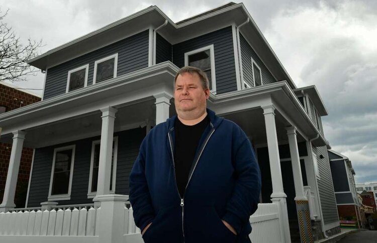 Resident Michael Michaud outside Pacific House Friday, April 16, 2021, a new property with 12 units of housing for formerly homeless individuals in Norwalk, Conn. Photo: Erik Trautmann / Hearst Connecticut Media